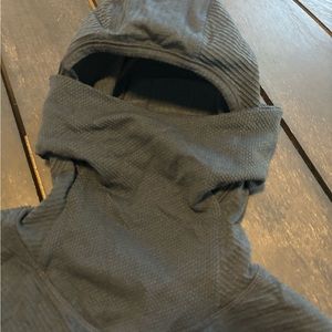 Athleta shirt with mask and hood as part of the design.